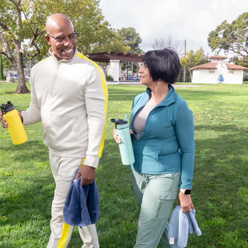 Man and woman discussing TruStage in Barron’s Best Annuities for Income and Growth feature in 2024 after exercising.