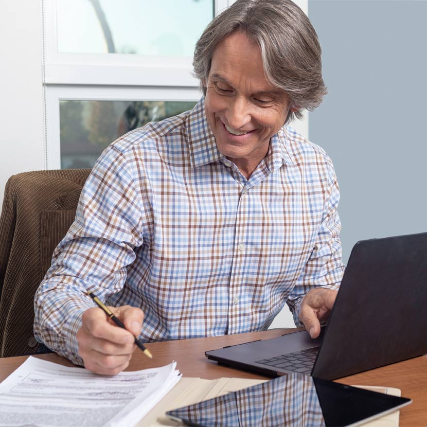 Man watching guided walkthroughs on Integrated Payment Protection