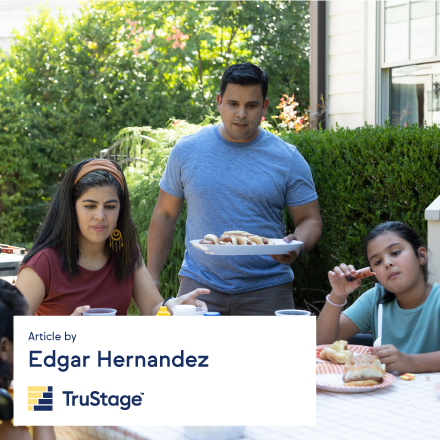 Hispanic family enjoying a cookout