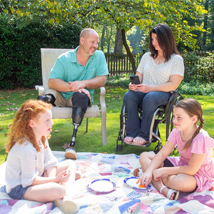 Father with dual prosthesis thankful for his disability insurance coverage so he can share special moments with his family