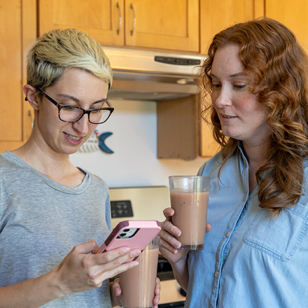 Two women talking in the kitchen